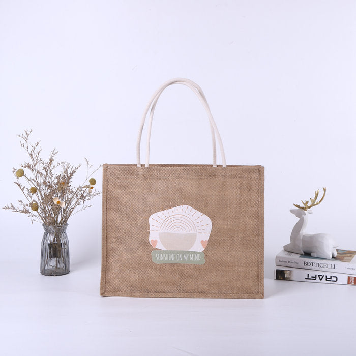 BOLSA YUTE 43X34,5X17CM DISEÃO SUNSHINE | WONDER WRAPPER | 1 UNIDAD | 8429640001543 Imagen principal del producto